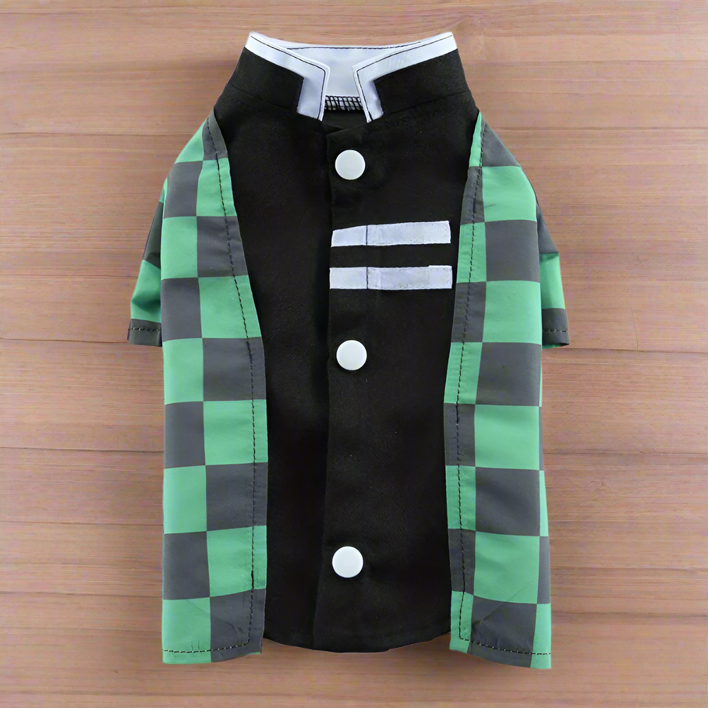 Pet coat with green and black checkered pattern on a white background