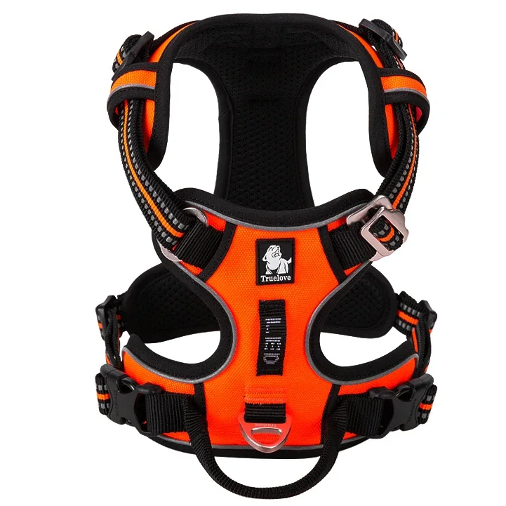 Orange and black dog harness on a white background