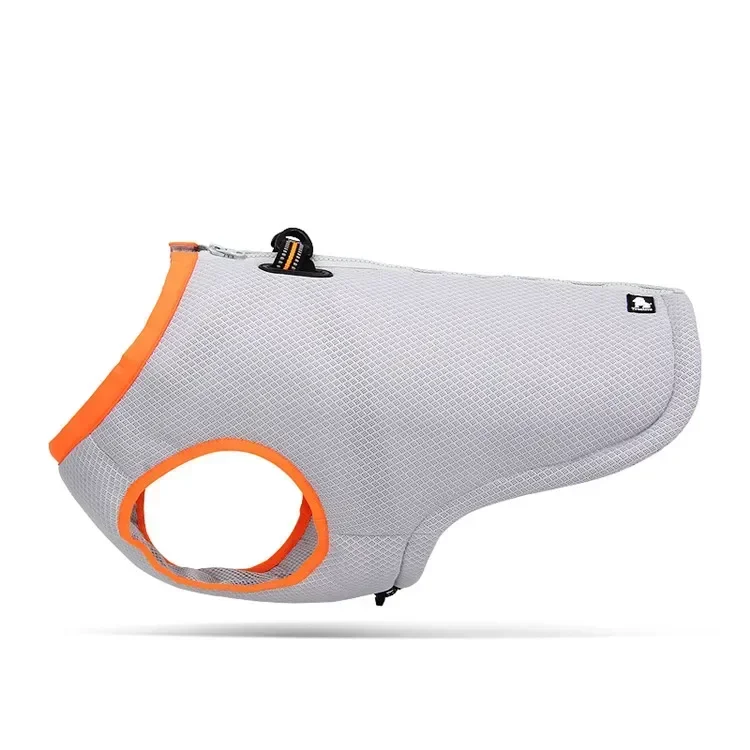 Gray dog harness with orange trim on a white background