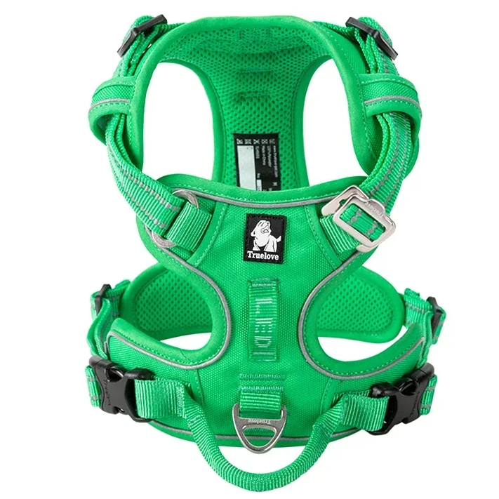 Green dog harness with reflective straps on a white background