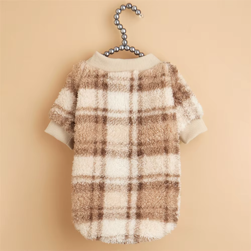 Wrap your small dog in style and comfort with our Cozy Chic Woolen Sweater. Perfect for Chihuahuas, Schnauzers, and puppies, this fleece pullover is a must-have for cooler weather walks. lightbrown