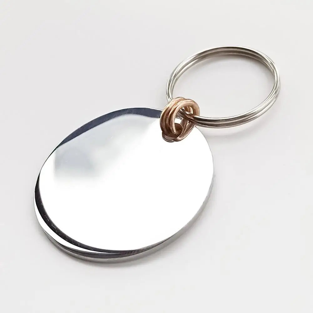 WoofMark Engraved Dog ID Tag – Custom Steel or Brass Pet Name Tag