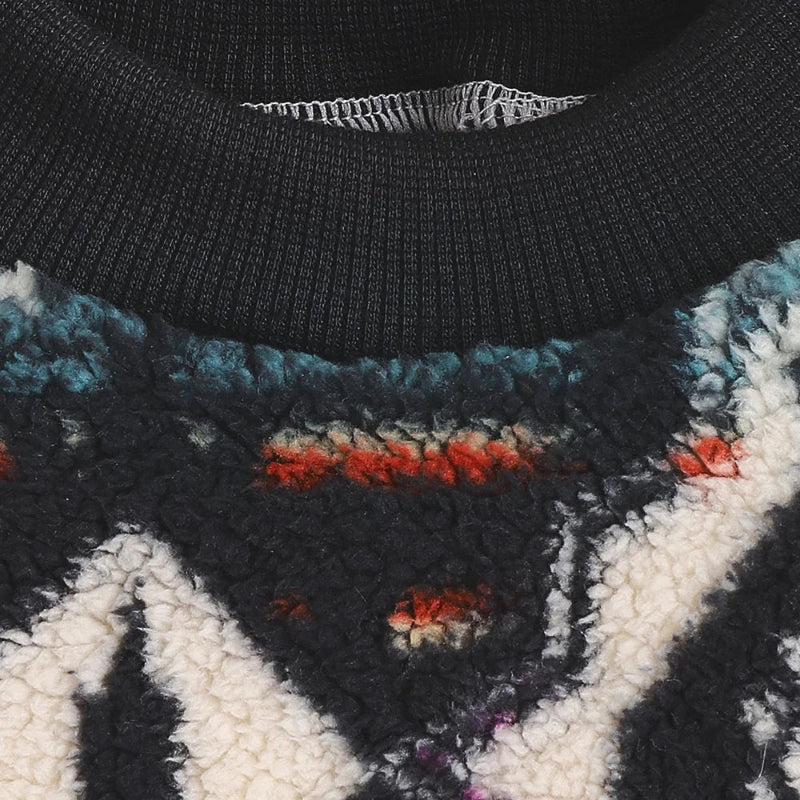 Wrap your small dog in style and comfort with our Cozy Chic Woolen Sweater. Perfect for Chihuahuas, Schnauzers, and puppies, this fleece pullover is a must-have for cooler weather walks. black detail