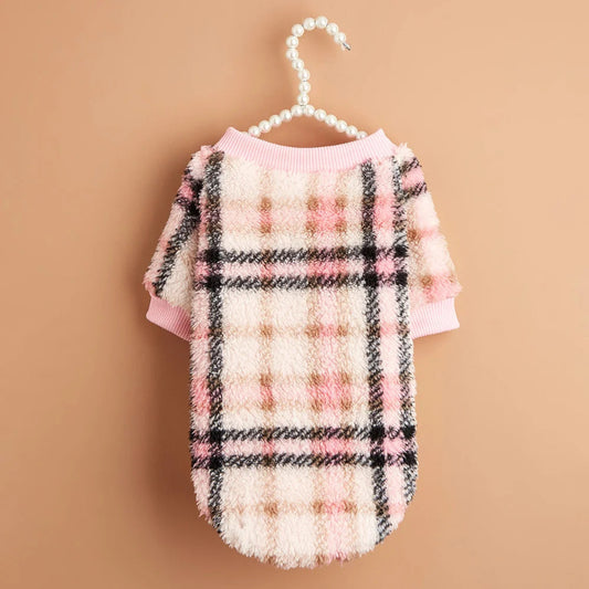 Wrap your small dog in style and comfort with our Cozy Chic Woolen Sweater. Perfect for Chihuahuas, Schnauzers, and puppies, this fleece pullover is a must-have for cooler weather walks. Plaid Pink