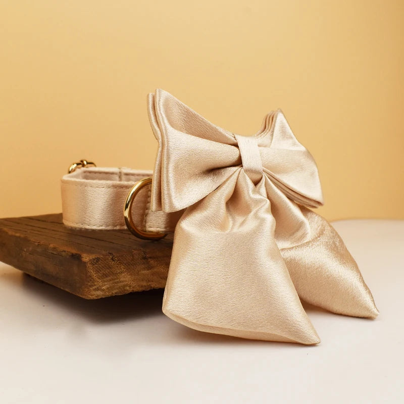 Pamper your pup with the Golden Luxe Silky Dog Set. Personalized bow, collar, leash, and harness in luxurious gold for an elegant, custom look. gold