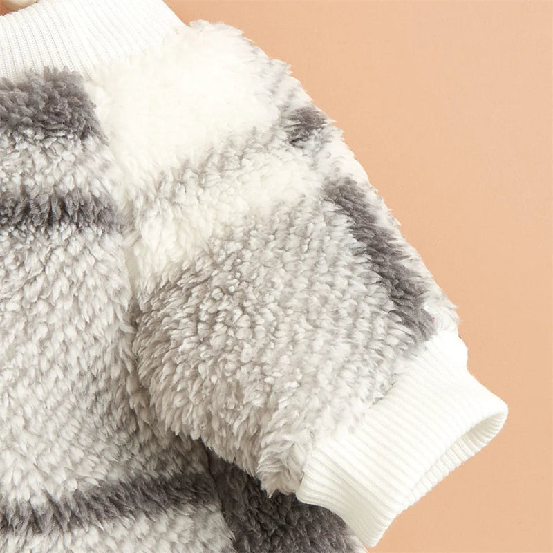 Wrap your small dog in style and comfort with our Cozy Chic Woolen Sweater. Perfect for Chihuahuas, Schnauzers, and puppies, this fleece pullover is a must-have for cooler weather walks. Plaid White detail