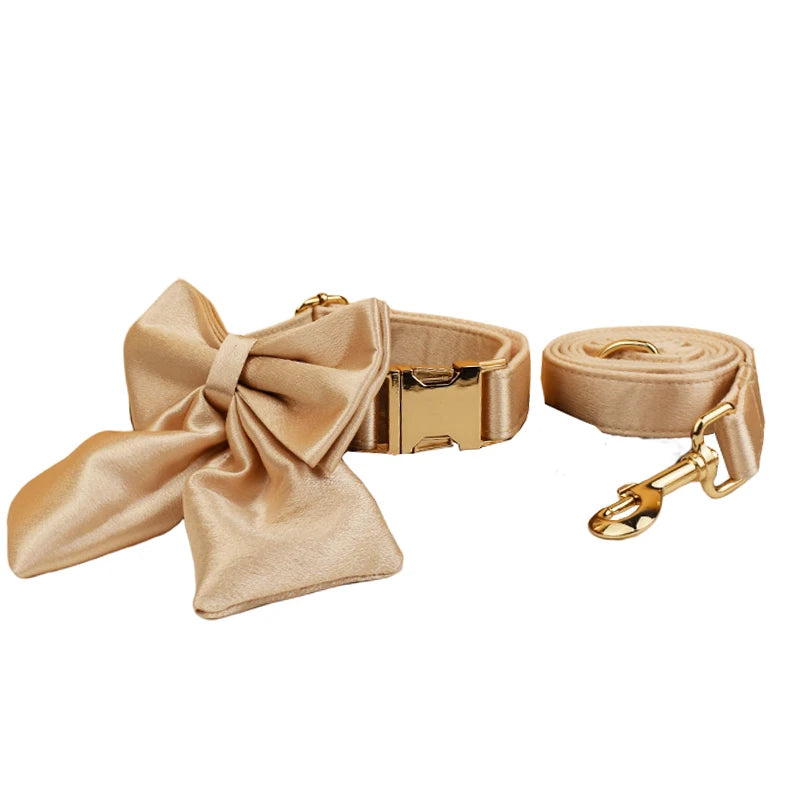 Pamper your pup with the Golden Luxe Silky Dog Set. Personalized bow, collar, leash, and harness in luxurious gold for an elegant, custom look. bow collar and leash