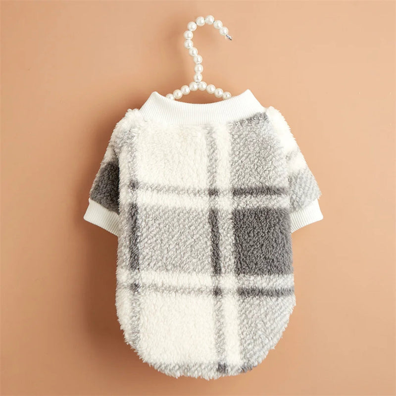 Wrap your small dog in style and comfort with our Cozy Chic Woolen Sweater. Perfect for Chihuahuas, Schnauzers, and puppies, this fleece pullover is a must-have for cooler weather walks. Plaid White