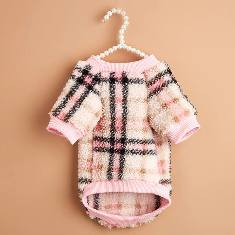 Wrap your small dog in style and comfort with our Cozy Chic Woolen Sweater. Perfect for Chihuahuas, Schnauzers, and puppies, this fleece pullover is a must-have for cooler weather walks. Plaid Pink 2