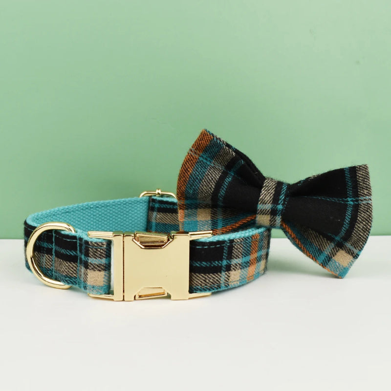 Add timeless elegance to your dog’s look with the Luxury Plaid Bow Tie Collar Collection. Premium quality, stylish plaid patterns, and detachable bow ties for versatile charm. dark blue with shade of orange brown plaid bollar and bow tie display