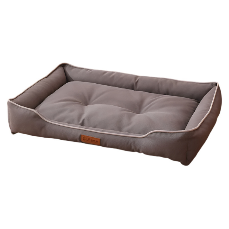 Gray pet bed with a brand logo on a white background