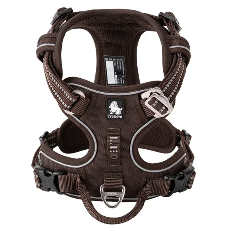 Brown dog harness with visible brand logo on a white background