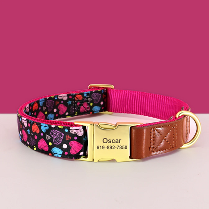 Dog collar with colorful heart pattern, pink ribbon, and gold nameplate on a pink background