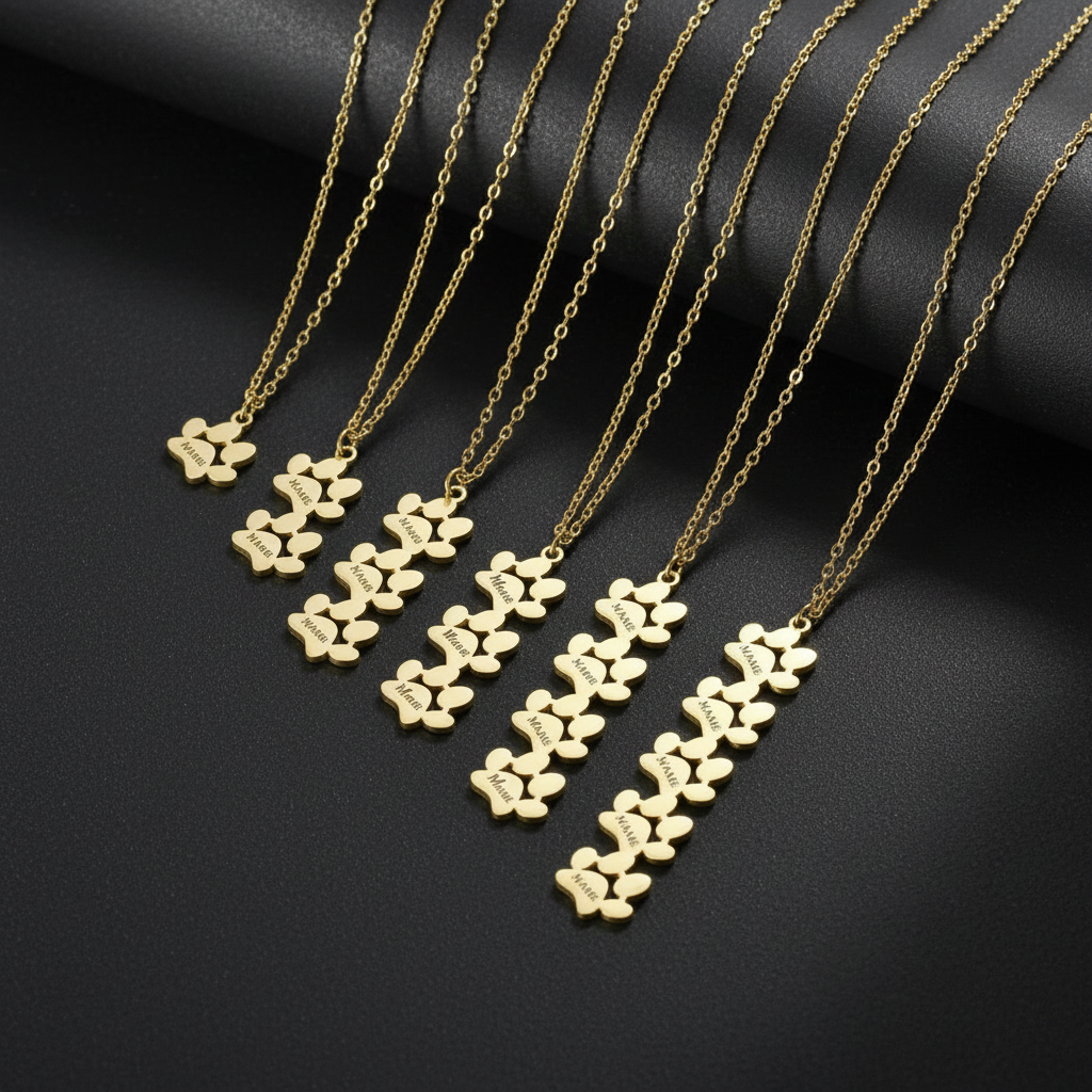 Show your love for your pet with the Personalized Stainless Steel Paw Print Necklace. Custom engraved and elegantly designed for a timeless, lasting keepsake. display of 5 necklaces between 1 and 5 paws