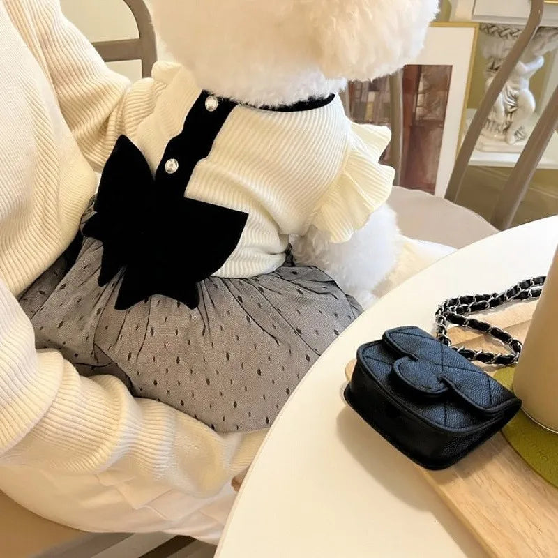 Dress your pup in luxury with the Elegant Bow Lace Dog Dress. Soft lace, a stunning bow, and a comfortable fit make this dress perfect for any stylish occasion. chic dog dress