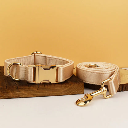 Pamper your pup with the Golden Luxe Silky Dog Set. Personalized bow, collar, leash, and harness in luxurious gold for an elegant, custom look. leash and collar