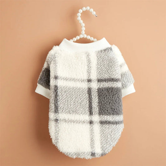 Wrap your small dog in style and comfort with our Cozy Chic Woolen Sweater. Perfect for Chihuahuas, Schnauzers, and puppies, this fleece pullover is a must-have for cooler weather walks. Plaid White