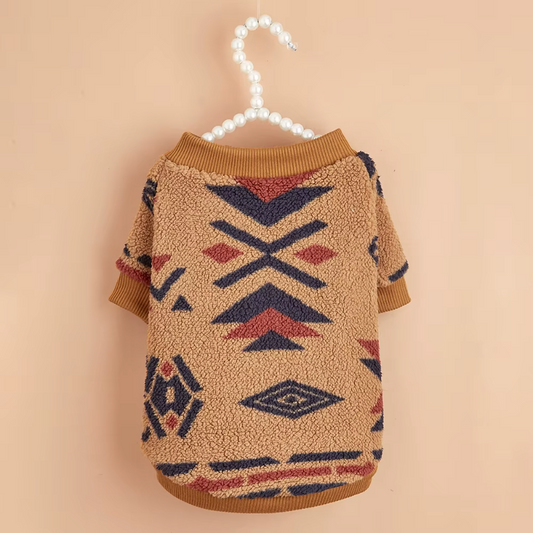 Wrap your small dog in style and comfort with our Cozy Chic Woolen Sweater. Perfect for Chihuahuas, Schnauzers, and puppies, this fleece pullover is a must-have for cooler weather walks. brown