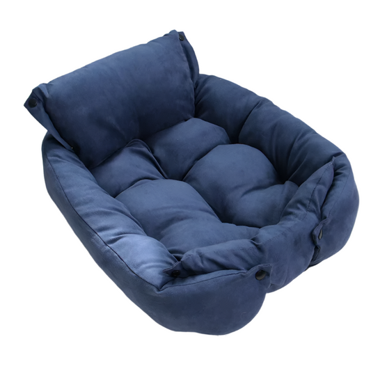 Blue pet bed on a white carpet
